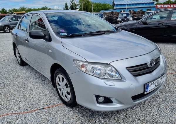 Toyota Corolla cena 21800 przebieg: 239000, rok produkcji 2009 z Tomaszów Mazowiecki małe 79